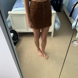 Brandy Melville brown corduroy mini skirt.